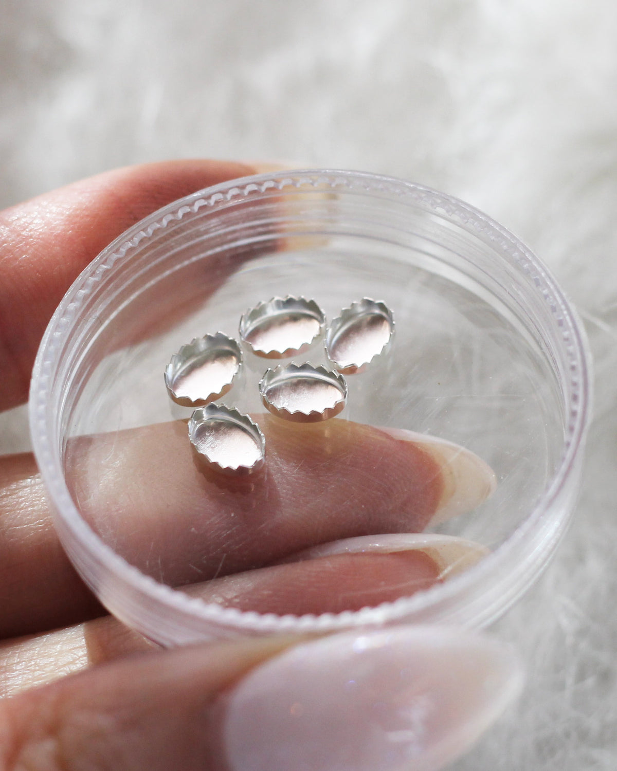 Sample B126 - 6x4mm Oval Serrated Bezel Cup Set of 16